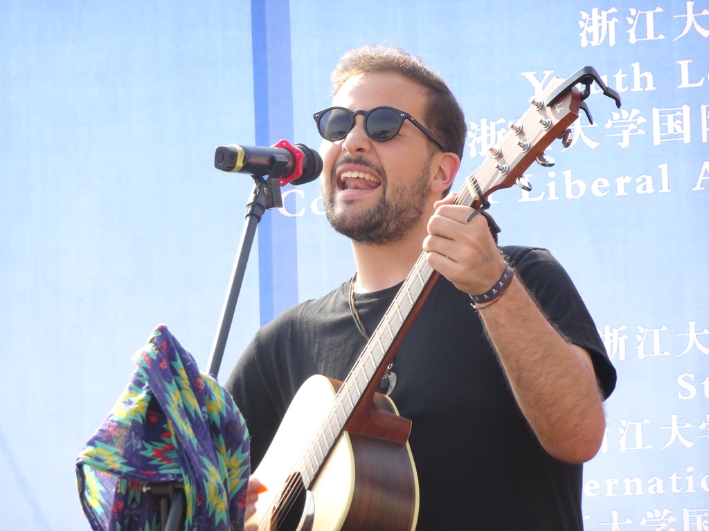 student singing on stage